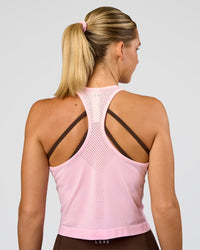 Woman wearing AeroFLX+ Seamless Flow Skimmer Tank - Marshmallow/Marshmallow | Model:Amity | Size:S | Thumbnail Index: 2
