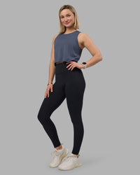 Woman wearing AeroFLX+ Seamless Skimmer Tank - Night Shadow/Night Shadow | Model:Halle | Size:S | Thumbnail Index: 0