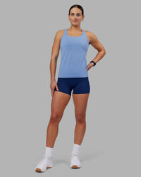 Woman wearing AeroFLX+ Seamless Tank - Cornflower Blue Marl | Model:Keisha | Size:S | Thumbnail Index: 0
