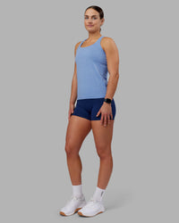Woman wearing AeroFLX+ Seamless Tank - Cornflower Blue Marl | Model:Keisha | Size:S | Thumbnail Index: 4