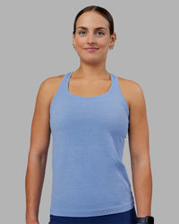 Woman wearing AeroFLX+ Seamless Tank - Cornflower Blue Marl | Model:Keisha | Size:S | Thumbnail Index: 2