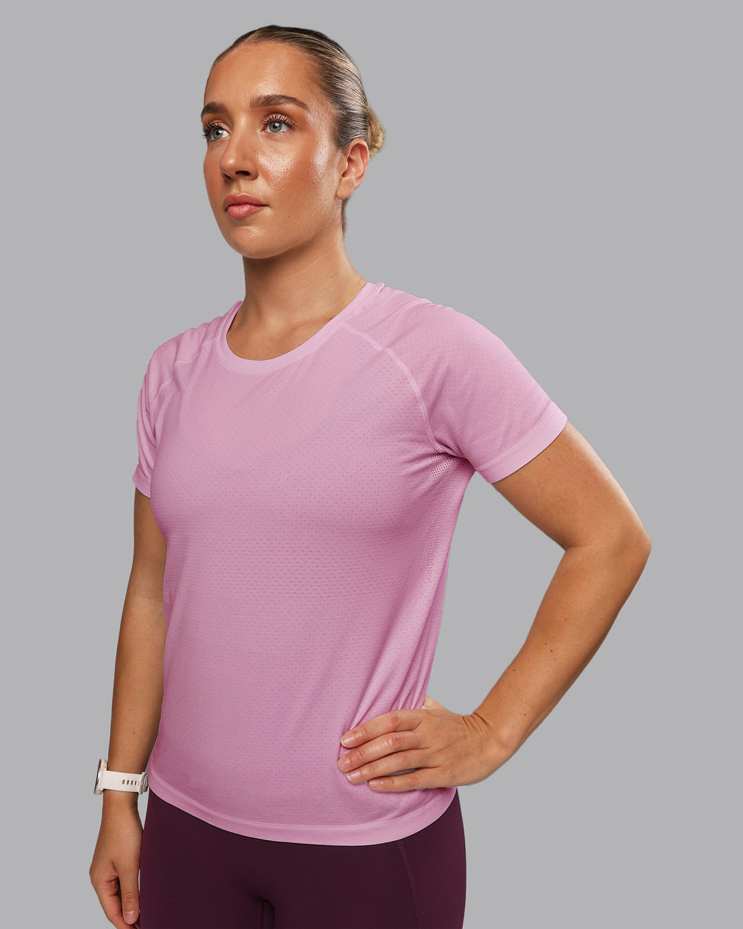 Woman wearing AeroFLX+ Seamless Tee - Pirouette-Bubblegum | Model:Lyss | Size:S - view 1