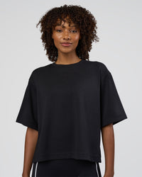 Woman wearing AfterDark ZeroCrease Cropped Tee - Black | Model:Tomi | Size:S | Thumbnail Index: 0