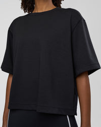 Woman wearing AfterDark ZeroCrease Cropped Tee - Black | Model:Tomi | Size:S | Thumbnail Index: 6