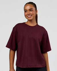 Woman wearing AfterDark ZeroCrease Cropped Tee - Cherry Lacquer | Model:Sophia | Size:S | Thumbnail Index: 0