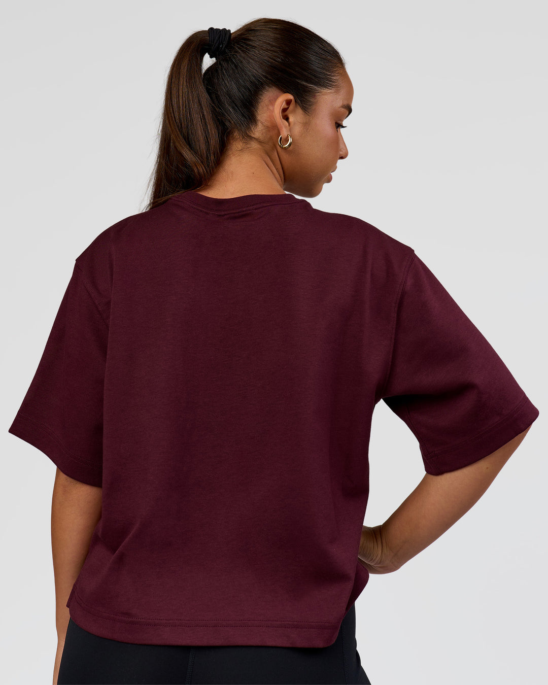 Woman wearing AfterDark ZeroCrease Cropped Tee - Cherry Lacquer | Model:Sophia | Size:S - view 5