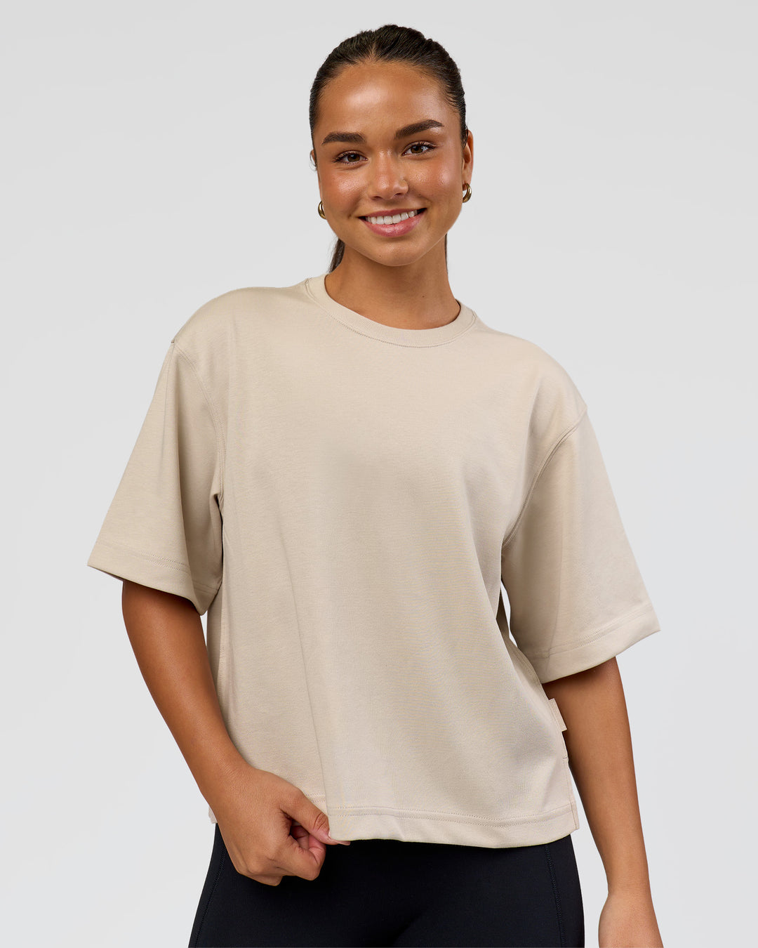 Woman wearing AfterDark ZeroCrease Cropped Tee - Shale Beige | Model:Sophia | Size:S - view 2