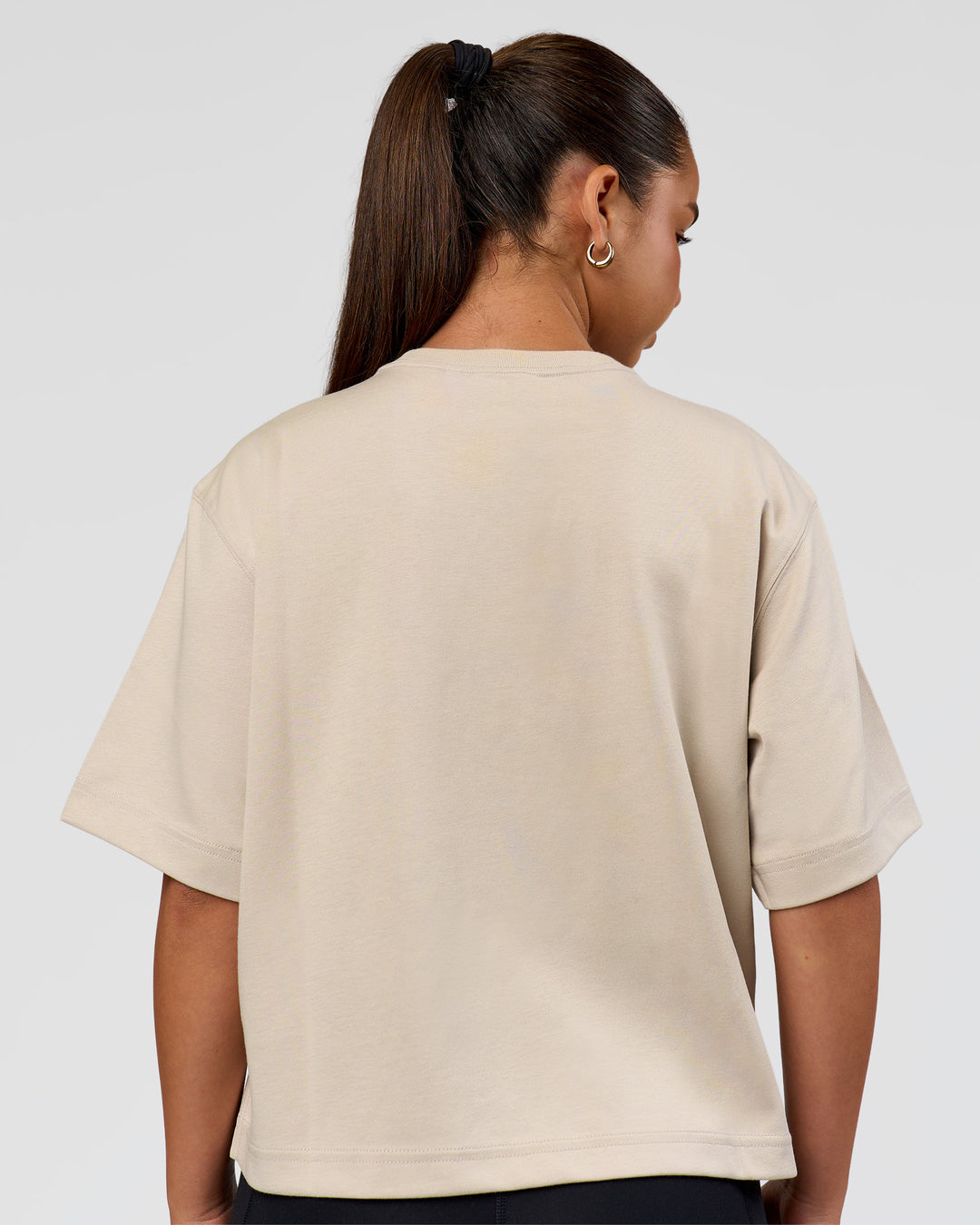 Woman wearing AfterDark ZeroCrease Cropped Tee - Shale Beige | Model:Sophia | Size:S - view 5