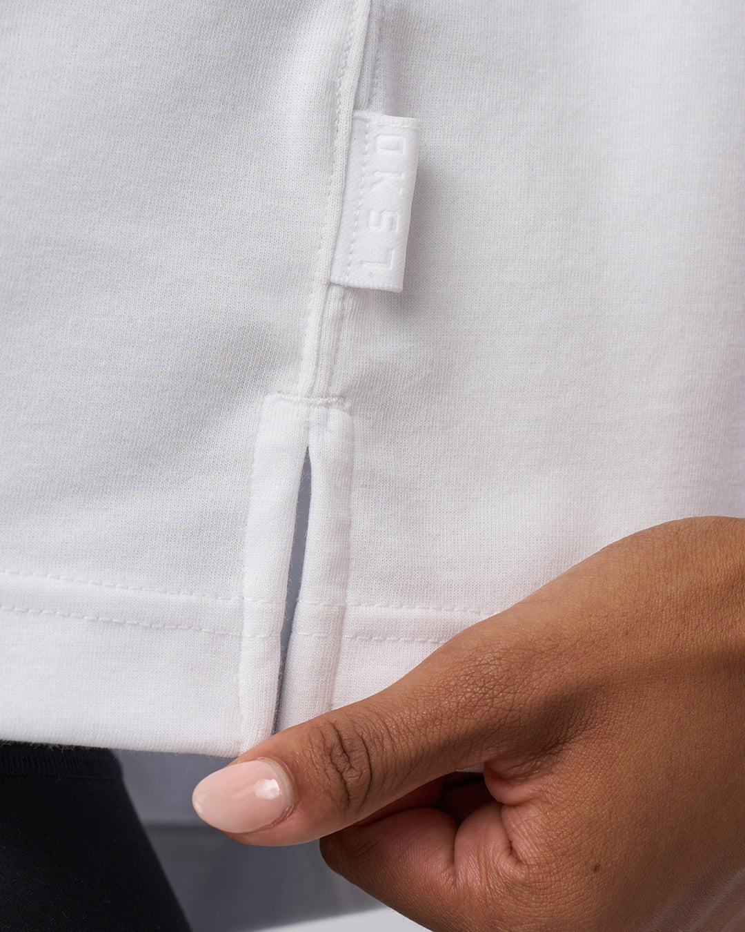Woman wearing AfterDark ZeroCrease Cropped Tee - White | Model:Tomi | Size:S - view 5