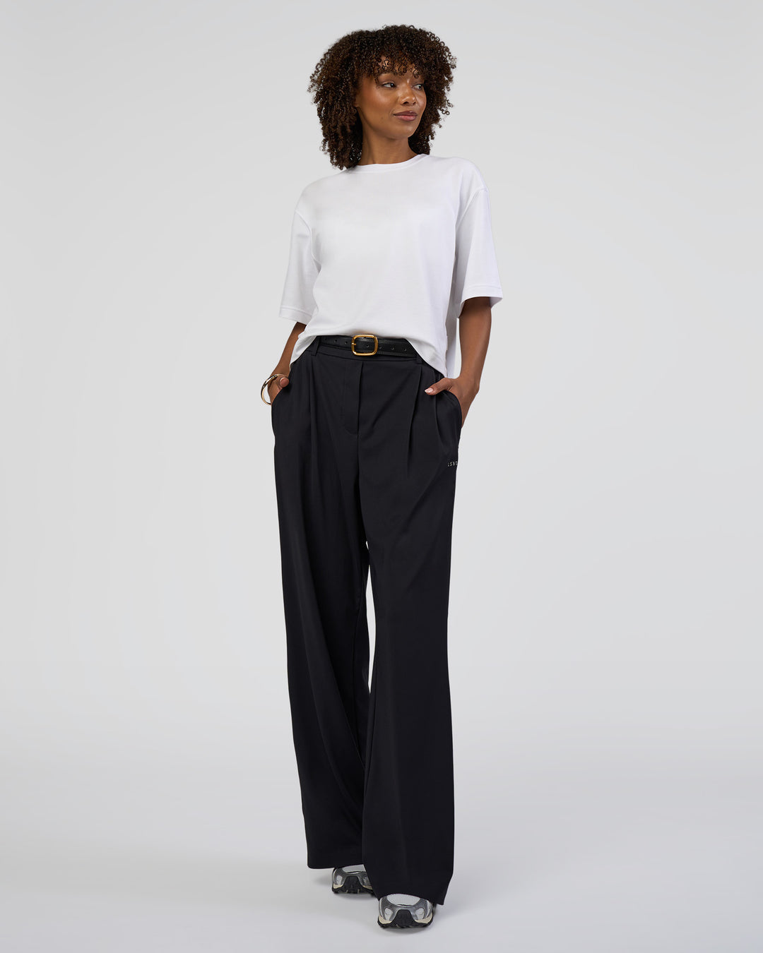 Woman wearing AfterDark ZeroCrease Cropped Tee - White | Model:Tomi | Size:S - view 6