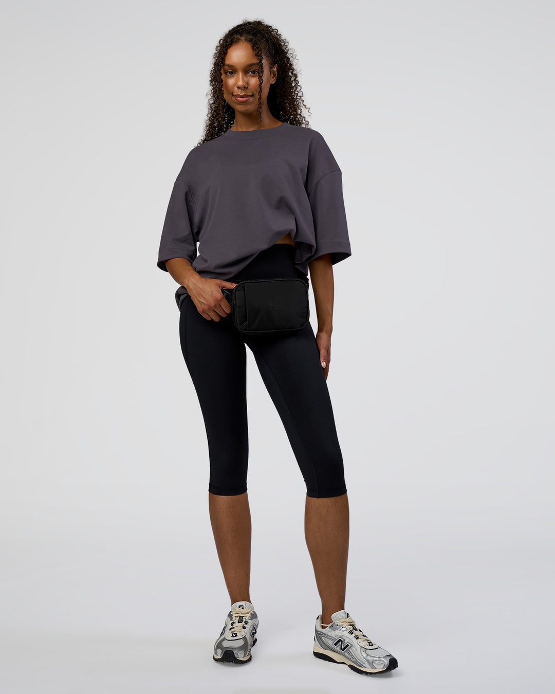 Woman wearing AfterDark ZeroCrease Oversized Tee - Dark Storm | Model:Jordan | Size:S - view 5