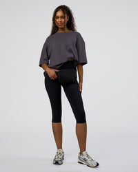 Woman wearing AfterDark ZeroCrease Oversized Tee - Dark Storm | Model:Jordan | Size:S | Thumbnail Index: 4
