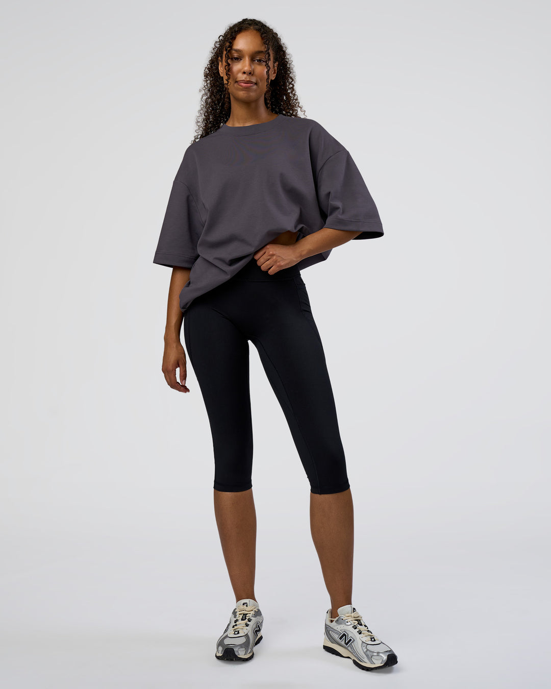 Woman wearing AfterDark ZeroCrease Oversized Tee - Dark Storm | Model:Jordan | Size:S - view 8