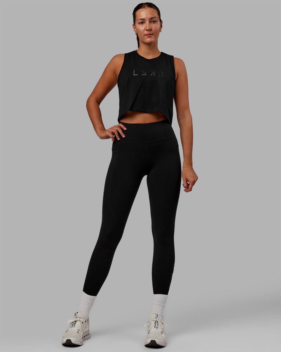 Woman wearing Agile FLXCotton Tank - Black-Black - view 2