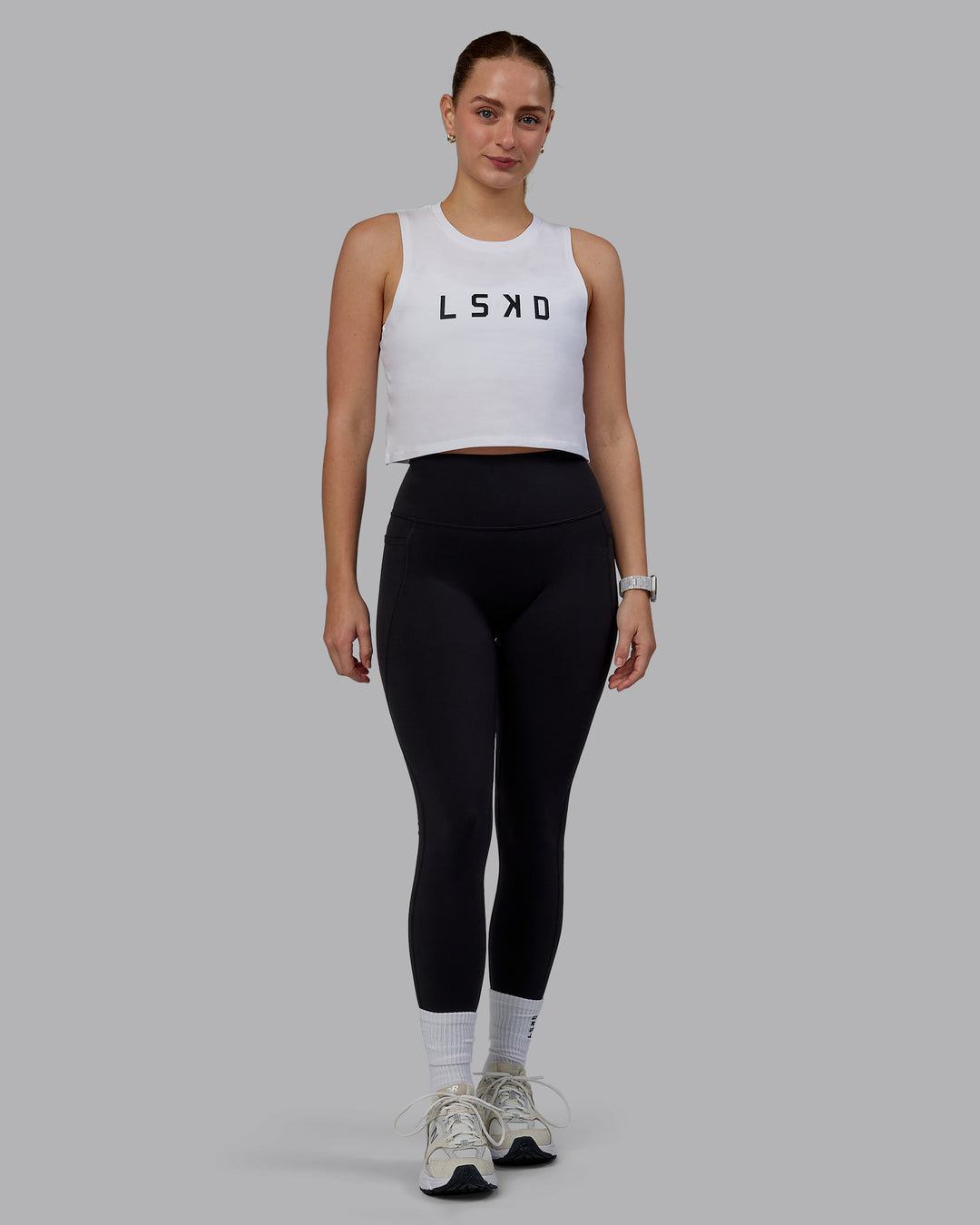 Woman wearing Agile FLXCotton Tank - White-Black - view 5