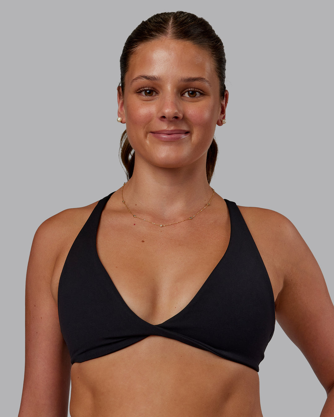 Woman wearing Agile Sports Bra - Black| Model:Phoebe | Size:S - view 2