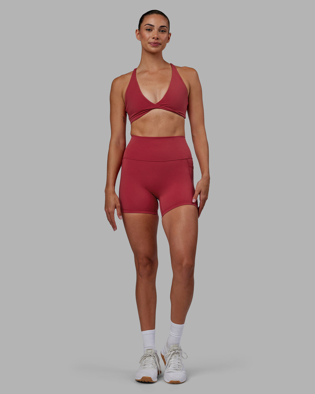 Woman wearing Agile Sports Bra - Claret - view 3