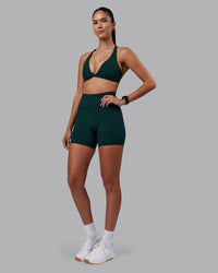 Woman wearing Agile Sports Bra - Dark Moss | Model:Rhiley | Size:S | Thumbnail Index: 2