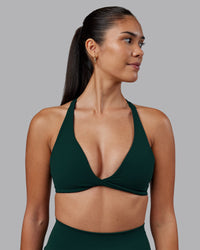Woman wearing Agile Sports Bra - Dark Moss | Model:Rhiley | Size:S | Thumbnail Index: 0