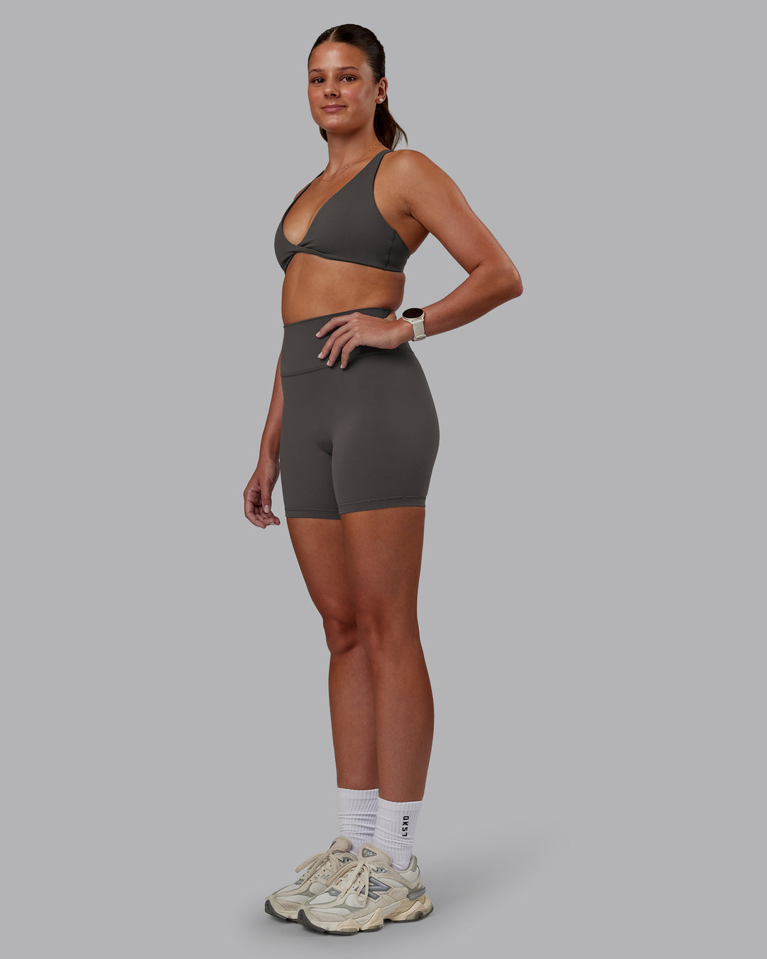 Woman wearing Agile Sports Bra - Dark Storm | Model:Phoebe | Size:S - view 3