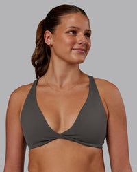 Woman wearing Agile Sports Bra - Dark Storm | Model:Phoebe | Size:S | Thumbnail Index: 0