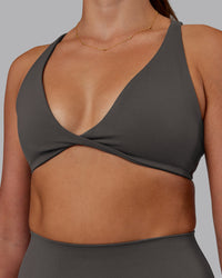 Woman wearing Agile Sports Bra - Dark Storm | Model:Phoebe | Size:S | Thumbnail Index: 4