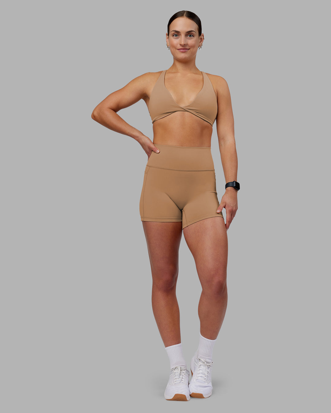Woman wearing Agile Sports Bra - Warm Smoke | Model:Keisha | Size:S - view 3