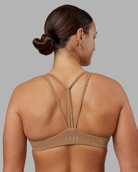 Woman wearing Agile Sports Bra - Warm Smoke | Model:Keisha | Size:S | Thumbnail Index: 5