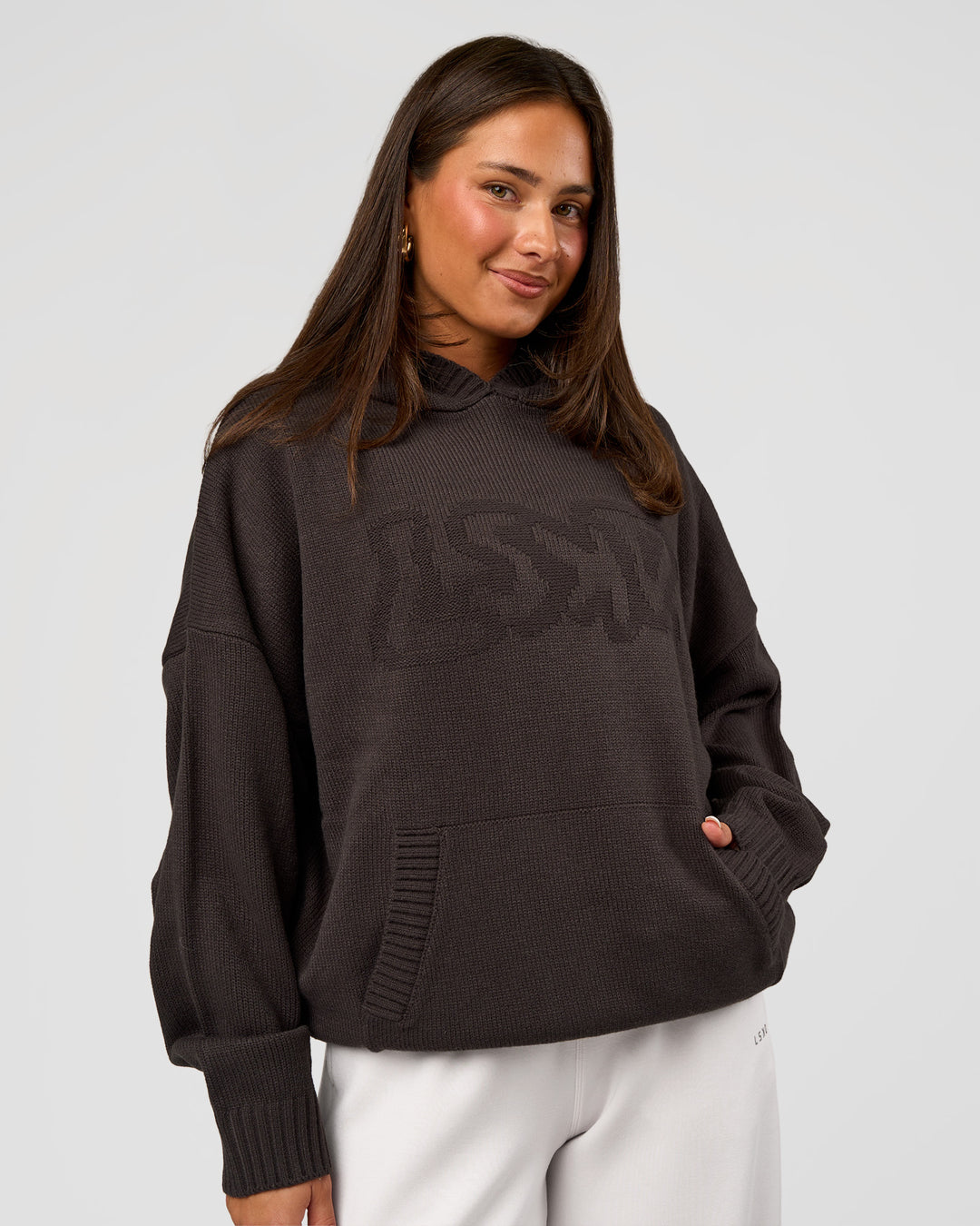 Woman wearing All Day Active Knitted Hoodie - Dark Storm | Model:Bianca | Size:S - view 1