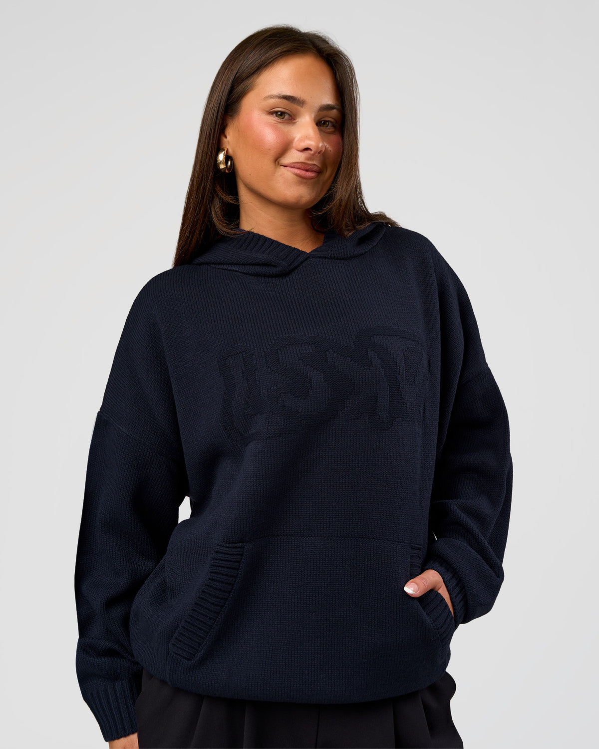 Woman wearing All Day Active Knitted Hoodie - Future Navy | Model:Bianca | Size:S