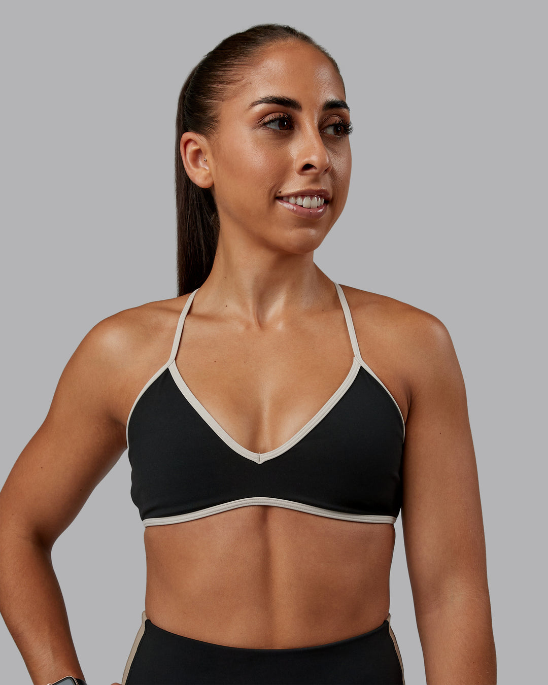Woman wearing Ambience Sports Bra - Black-Multi | Model:Tylah | Size:S - view 1
