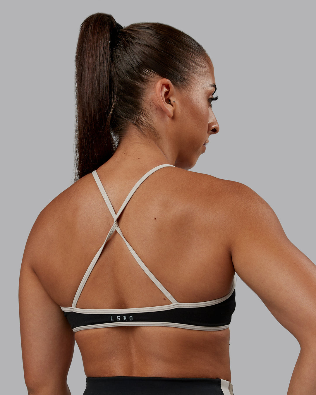 Woman wearing Ambience Sports Bra - Black-Multi | Model:Tylah | Size:S - view 2
