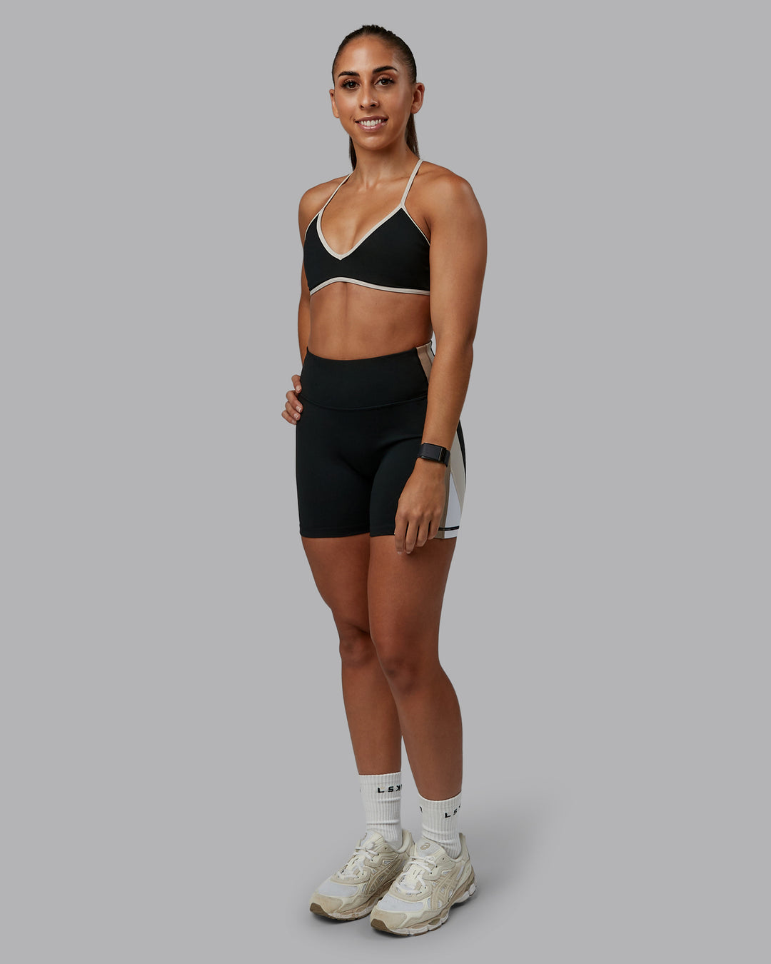 Woman wearing Ambience Sports Bra - Black-Multi | Model:Tylah | Size:S - view 3