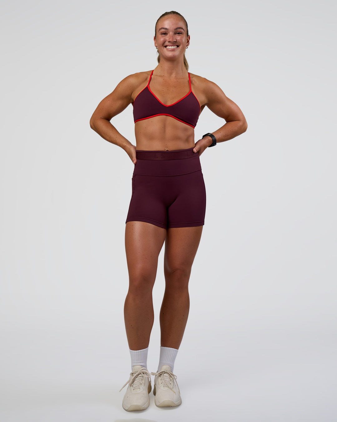 Woman wearing Ambience Sports Bra - Cherry Lacquer-Flame | Model:Sav | Size:S - view 5