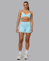 Woman wearing Ambience Sports Bra - Crystal Blue-Lemon | Thumbnail Index: 4