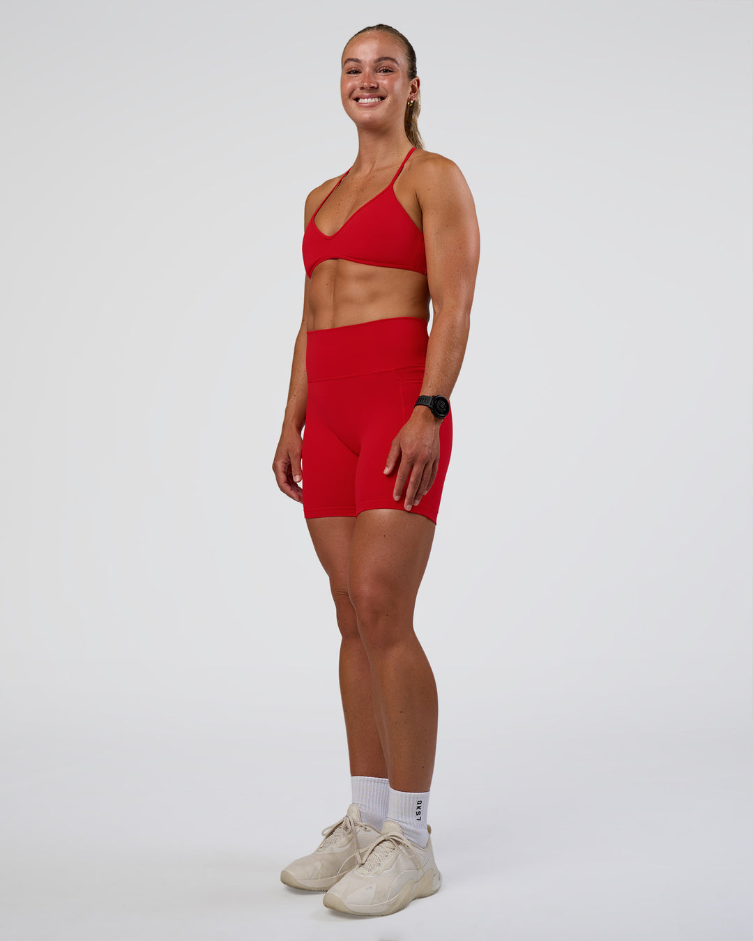 Woman wearing Ambience Sports Bra - Flame | Model:Sav | Size:S - view 3
