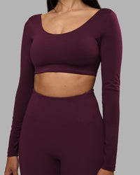 Woman wearing Aria Long Sleeve Sports Bra - Cherry Lacquer | Model:Rhiley | Size:S | Thumbnail Index: 6