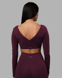 Woman wearing Aria Long Sleeve Sports Bra - Cherry Lacquer | Model:Rhiley | Size:S | Thumbnail Index: 4