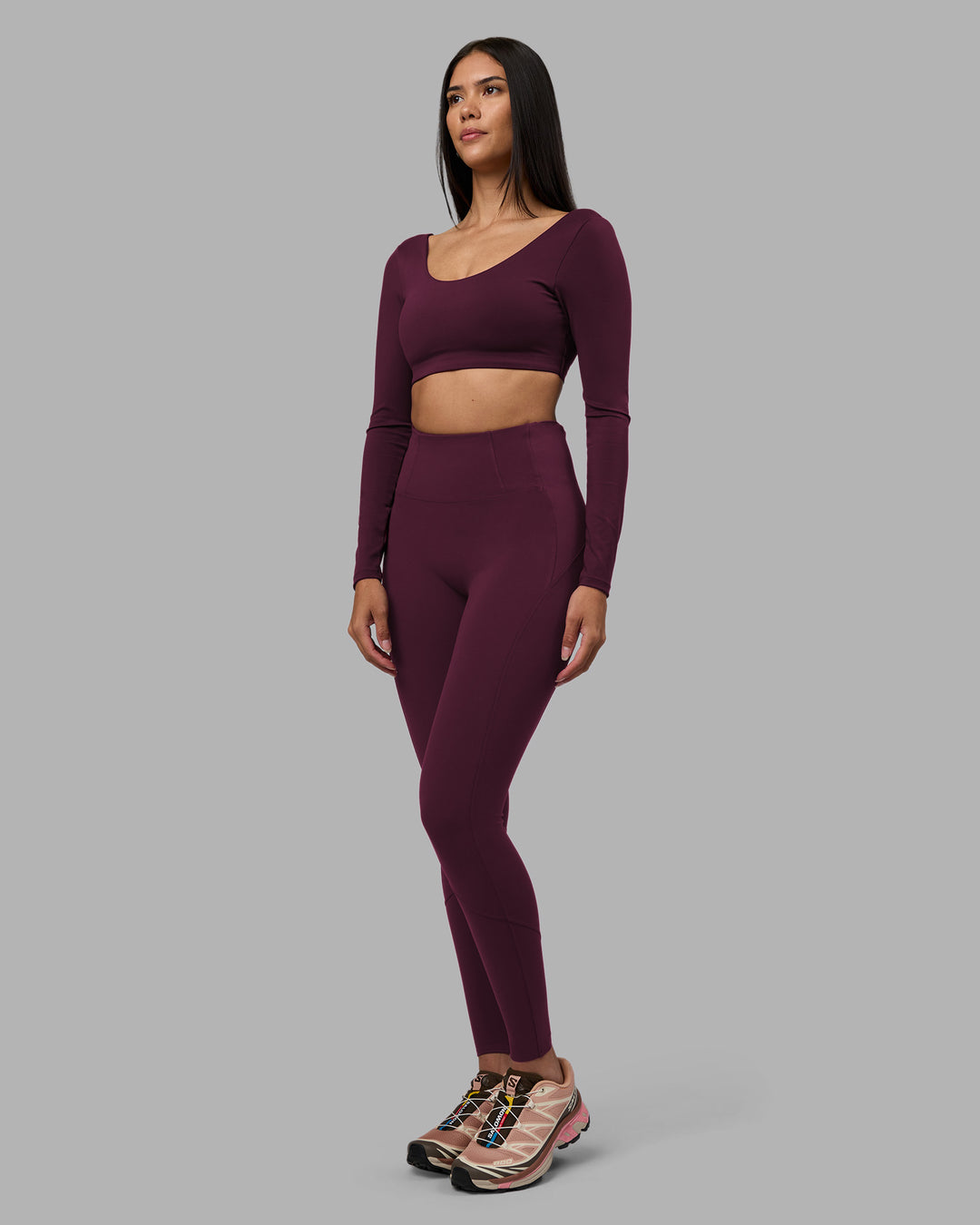 Woman wearing Aria Long Sleeve Sports Bra - Cherry Lacquer | Model:Rhiley | Size:S - view 4