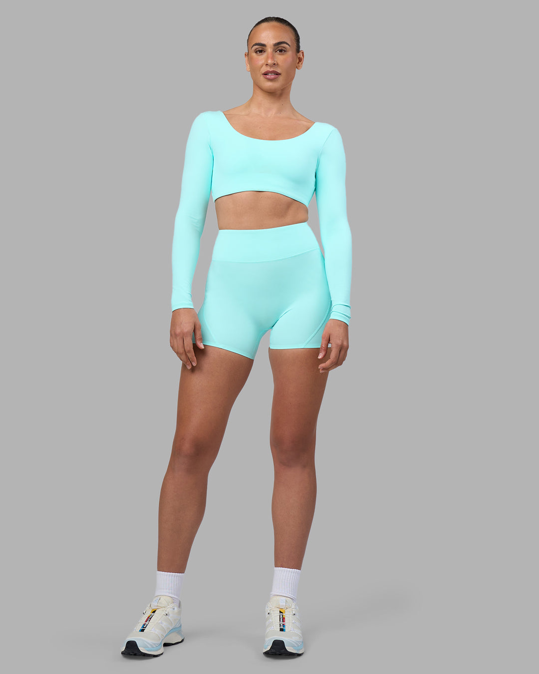 Woman wearing Aria Long Sleeve Sports Bra - Island Paradise | Model:Sophie | Size:S - view 8
