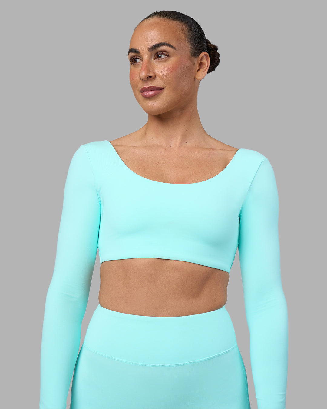 Woman wearing Aria Long Sleeve Sports Bra - Island Paradise | Model:Sophie | Size:S - view 4