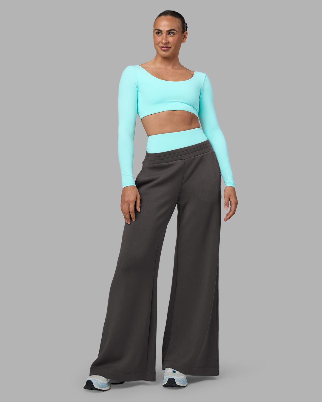 Woman wearing Aria Long Sleeve Sports Bra - Island Paradise | Model:Sophie | Size:S - view 1