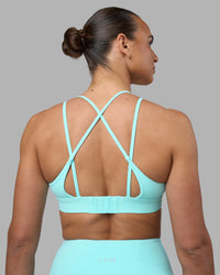 Woman wearing Aria Triangle Sports Bra - Island Paradise | Model:Sophie | Size:S | Thumbnail Index: 5