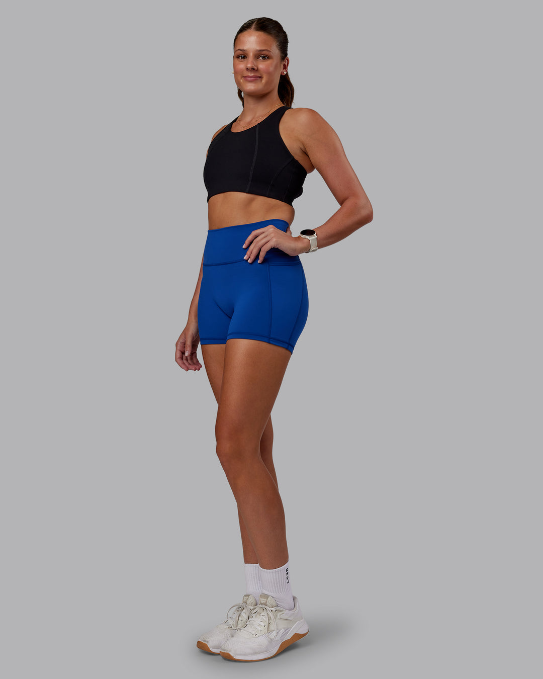 Woman wearing Ascent Sports Bra - Black | Model:Phoebe | Size:S - view 4