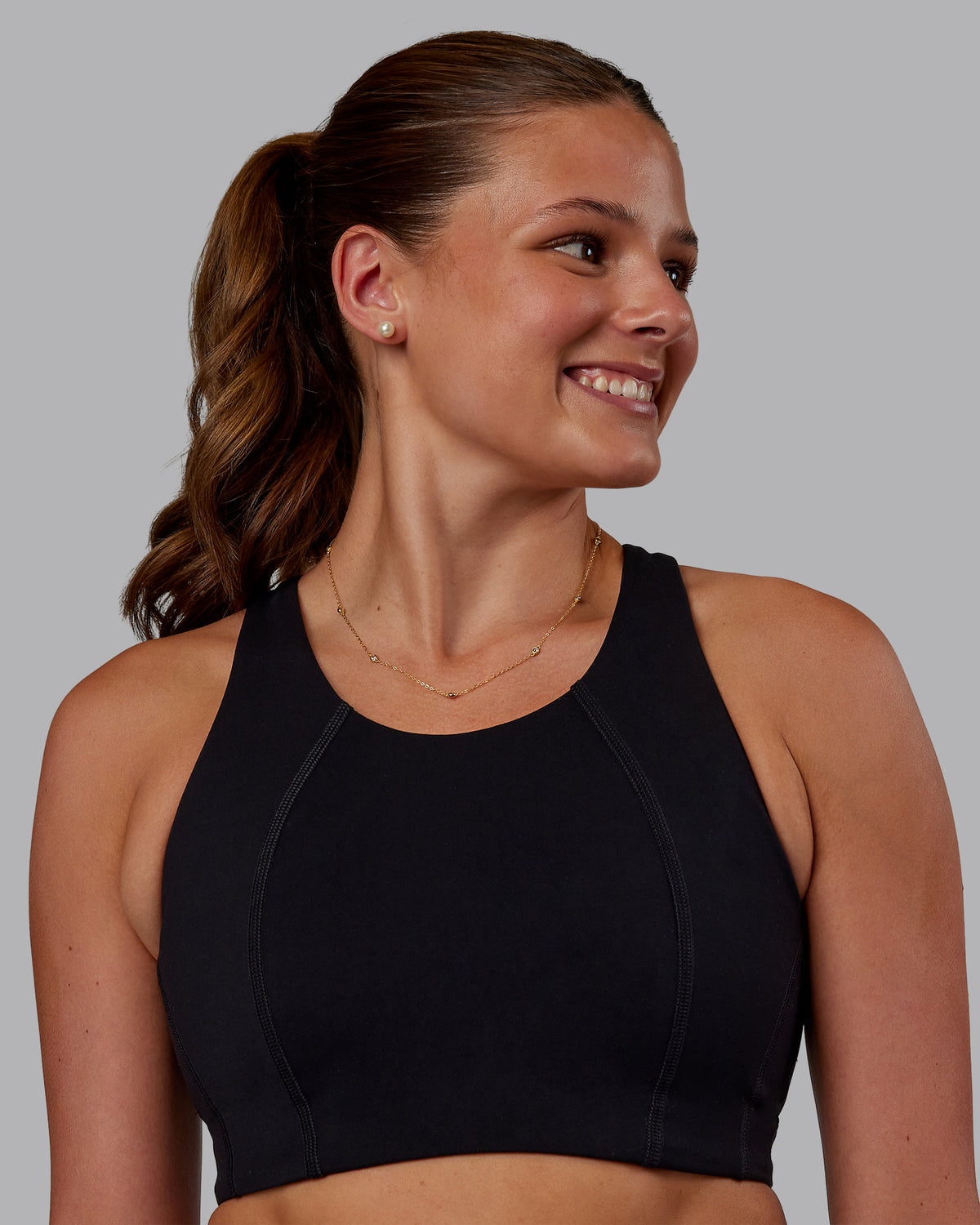 Woman wearing Ascent Sports Bra - Black | Model:Phoebe | Size:S