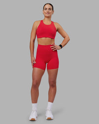 Woman wearing Ascent Sports Bra - Scarlet | Model:Keisha | Size:S | Thumbnail Index: 6