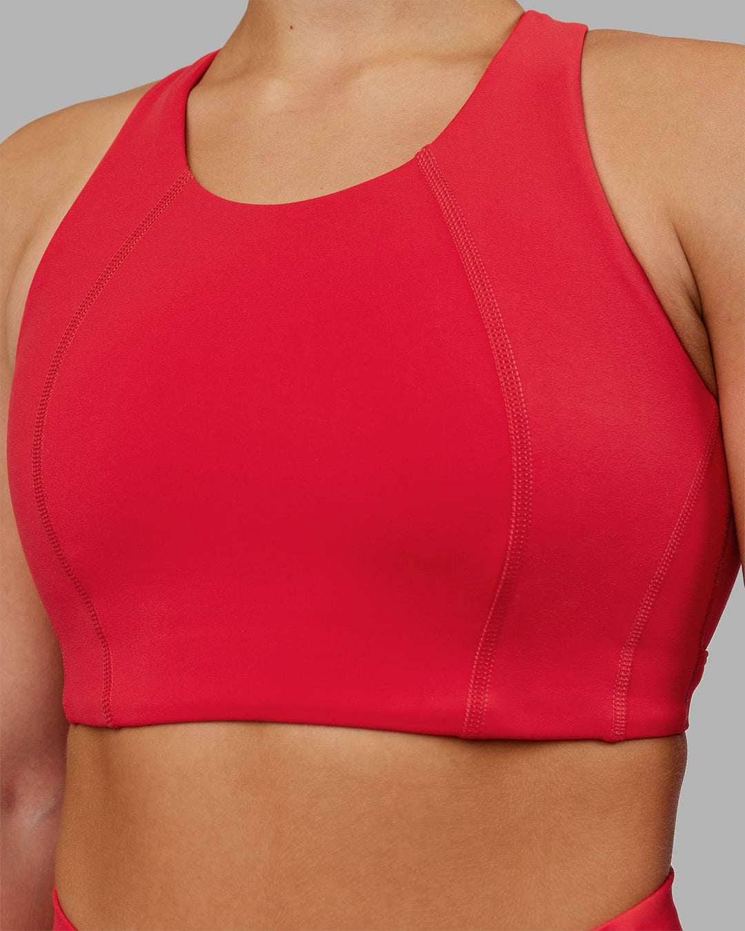Woman wearing Ascent Sports Bra - Scarlet | Model:Keisha | Size:S - view 6