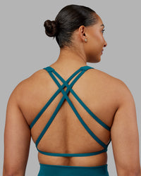 Woman wearing Aspire Sports Bra - Blue Coral | Model:Ayla | Size:S | Thumbnail Index: 1
