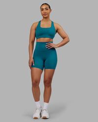Woman wearing Aspire Sports Bra - Blue Coral | Model:Ayla | Size:S | Thumbnail Index: 4