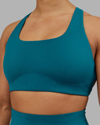 Woman wearing Aspire Sports Bra - Blue Coral | Model:Ayla | Size:S | Thumbnail Index: 3